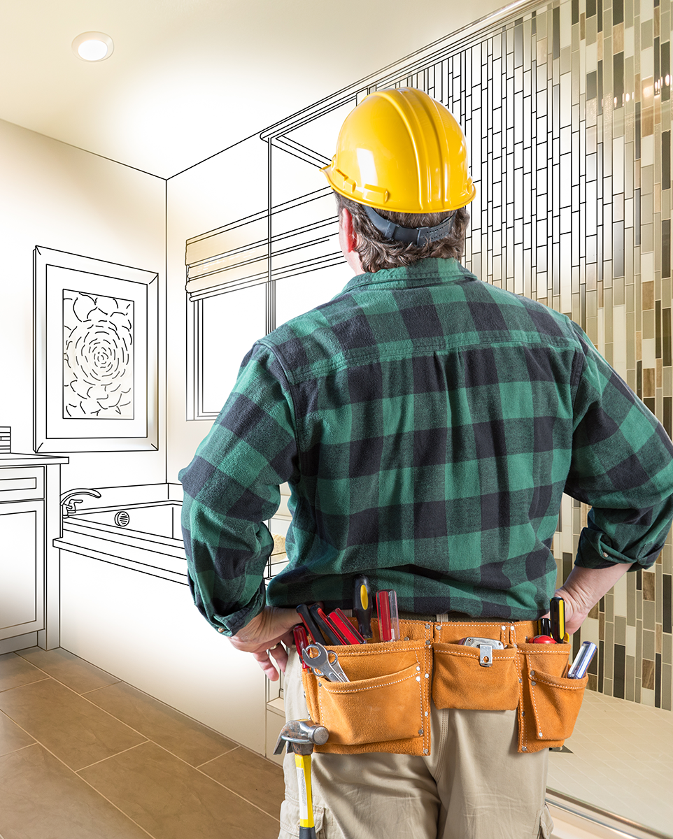 Contractor and client studying ADU plans